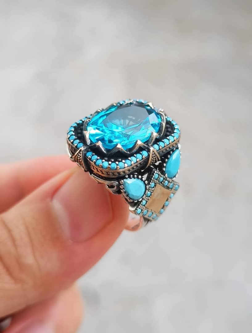 خاتم رجالي فخم – بريق فضة ونقاء لون الأزرق الأكوامارين
